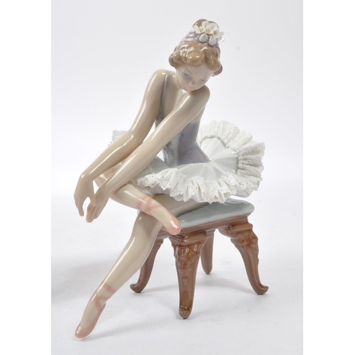 100 - Lladro - Two china porcelain Lladro ballerina figurines with detailed lacework to bottom of tutu dre... 