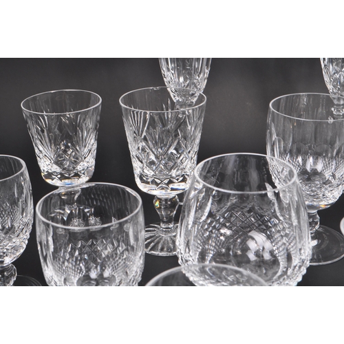 102 - Waterford Crystal - A large collection of Irish crystal glass drinking / display glasses. Comprising... 