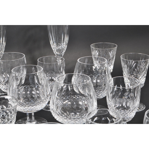 102 - Waterford Crystal - A large collection of Irish crystal glass drinking / display glasses. Comprising... 