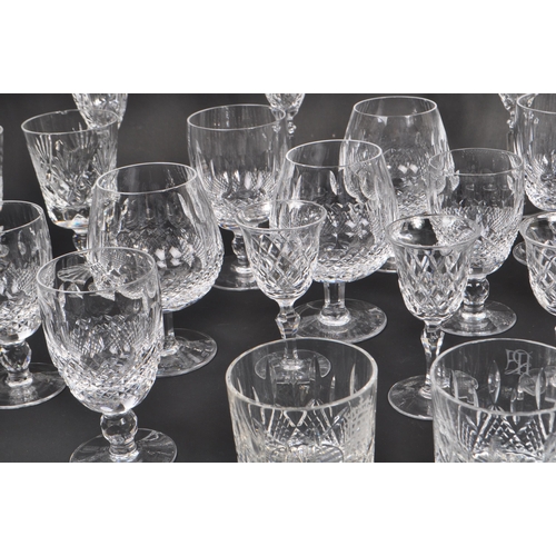 102 - Waterford Crystal - A large collection of Irish crystal glass drinking / display glasses. Comprising... 