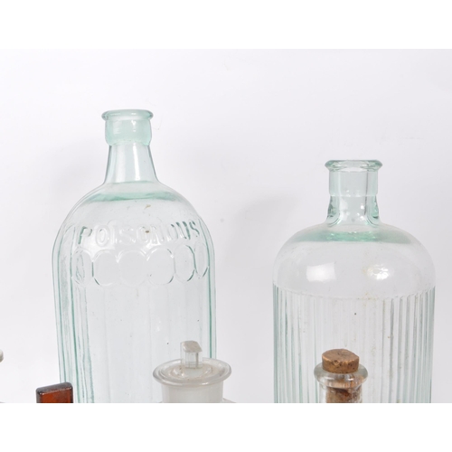 111 - A large collection of 19th and 20th century glass bottles. The collection consisting of a variety of... 