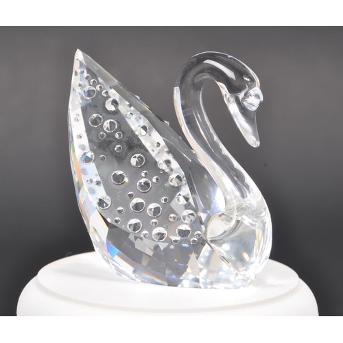 112 - Swarovski - A collection of three boxed Swarovski crystal bird figures. The collection to include a ... 