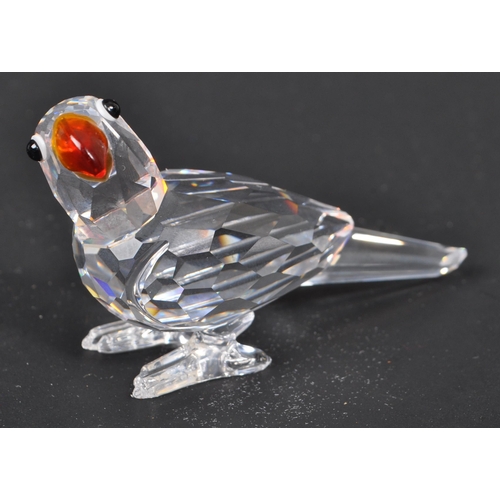 112 - Swarovski - A collection of three boxed Swarovski crystal bird figures. The collection to include a ... 