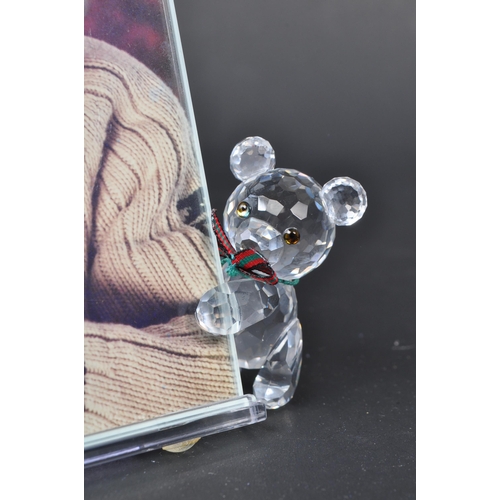 113 - Swarovski - A collection of boxed Swarovski crystal teddy bear figures. The collection to include th... 