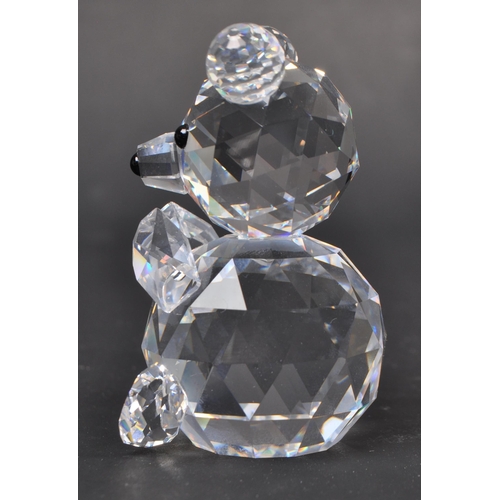 113 - Swarovski - A collection of boxed Swarovski crystal teddy bear figures. The collection to include th... 