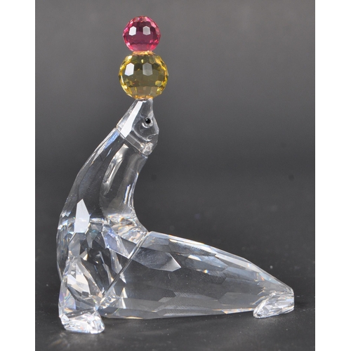 117 - Swarovski - A collection of boxed Swarovski crystal animal figure ornaments. The collection consisti... 