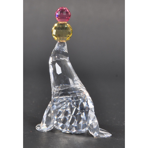 117 - Swarovski - A collection of boxed Swarovski crystal animal figure ornaments. The collection consisti... 