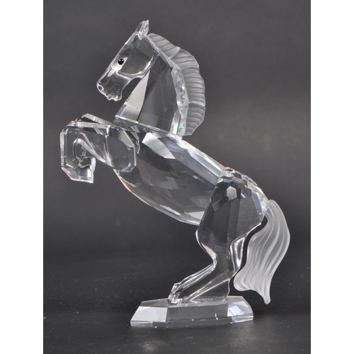 117 - Swarovski - A collection of boxed Swarovski crystal animal figure ornaments. The collection consisti... 