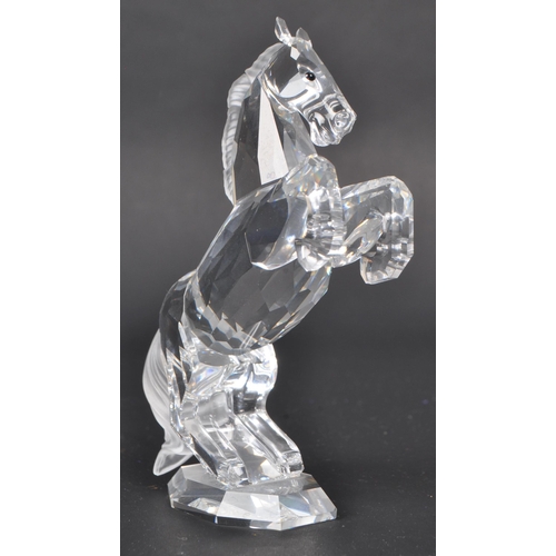 117 - Swarovski - A collection of boxed Swarovski crystal animal figure ornaments. The collection consisti... 