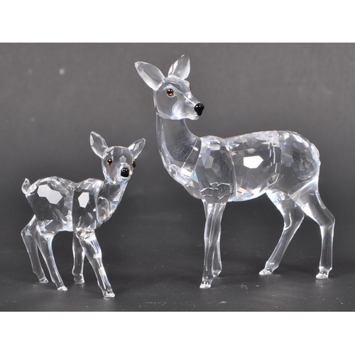 118 - Swarovski - Two Swarovski crystal animal figure ornaments. The collection consisting of two deer fig... 