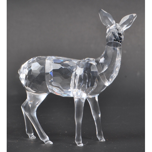 118 - Swarovski - Two Swarovski crystal animal figure ornaments. The collection consisting of two deer fig... 