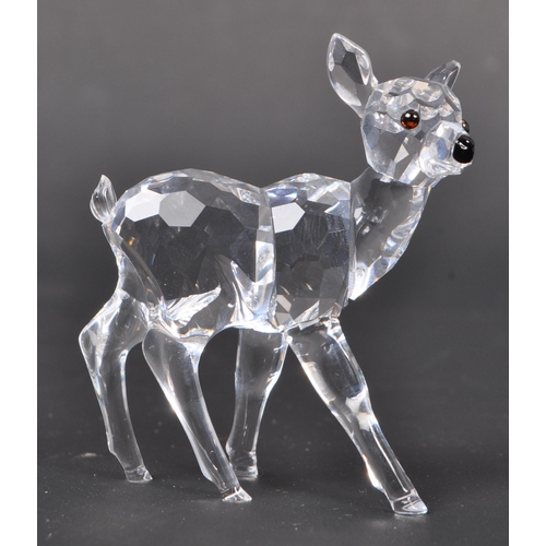 118 - Swarovski - Two Swarovski crystal animal figure ornaments. The collection consisting of two deer fig... 