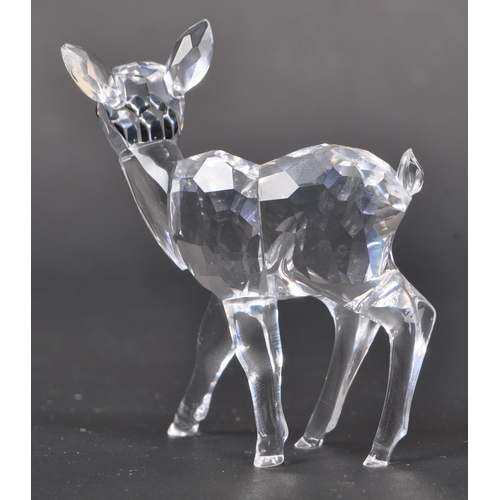 118 - Swarovski - Two Swarovski crystal animal figure ornaments. The collection consisting of two deer fig... 