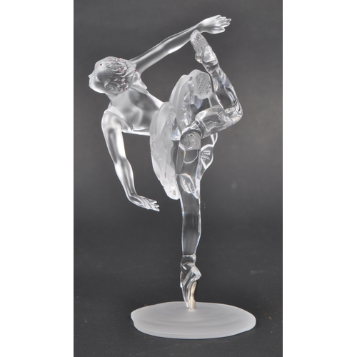 120 - Swarovski - A boxed Swarovski crystal ballerina figure. The figure being posed in a dancing motion, ... 