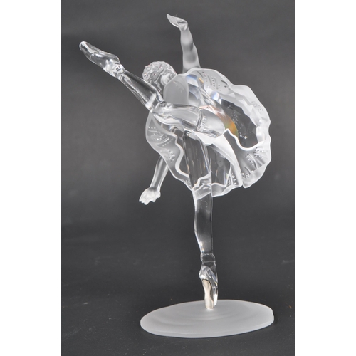 120 - Swarovski - A boxed Swarovski crystal ballerina figure. The figure being posed in a dancing motion, ... 