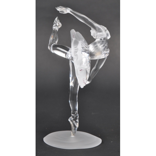 120 - Swarovski - A boxed Swarovski crystal ballerina figure. The figure being posed in a dancing motion, ... 