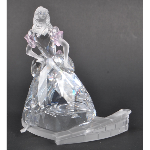 121 - Swarovski - A boxed Swarovski crystal Cinderella with slipper figure. The figure being posed mid ste... 