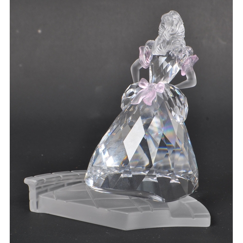 121 - Swarovski - A boxed Swarovski crystal Cinderella with slipper figure. The figure being posed mid ste... 