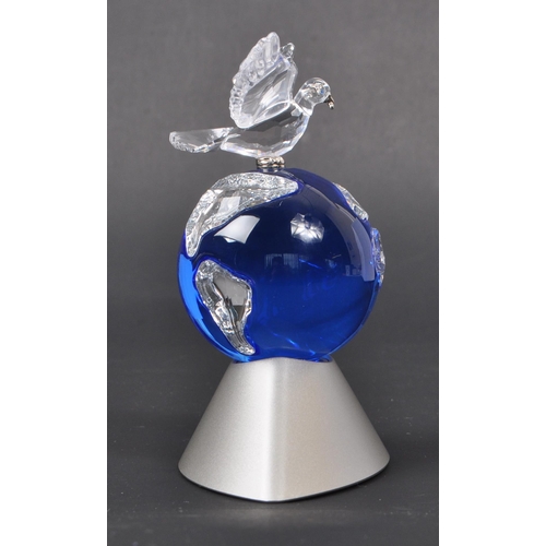 123 - Swarovski - A boxed Millenium edition Swarovski Crystal Planet Vision 2000 ornamental planet decorat... 