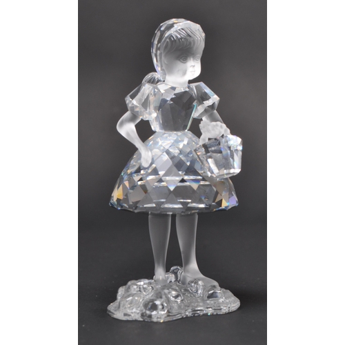 129 - Swarovski - A collection of boxed Swarovski crystal decorative figures. The collection to include a ... 