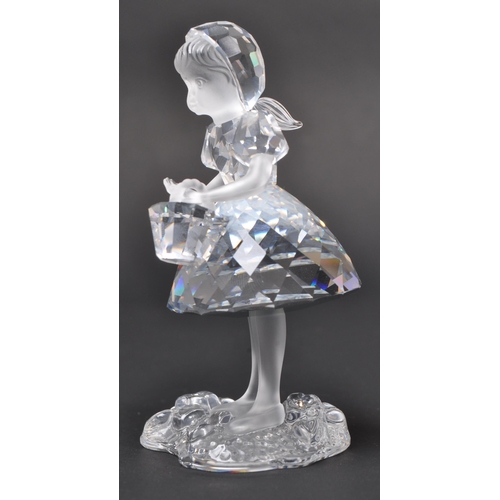 129 - Swarovski - A collection of boxed Swarovski crystal decorative figures. The collection to include a ... 