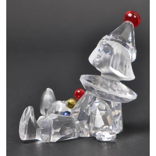 129 - Swarovski - A collection of boxed Swarovski crystal decorative figures. The collection to include a ... 