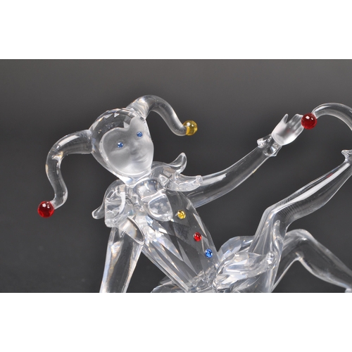 129 - Swarovski - A collection of boxed Swarovski crystal decorative figures. The collection to include a ... 