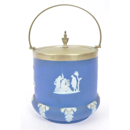 130 - Wedgwood - Jasperware - An early 20th century dark blue biscuit barrel. With a silver plate lid and ... 