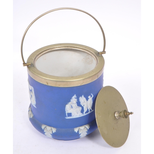 130 - Wedgwood - Jasperware - An early 20th century dark blue biscuit barrel. With a silver plate lid and ... 