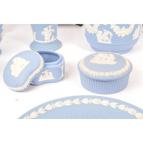 136 - Wedgwood Jasperware - A collection of 20th Century ceramic Wedgwood Jasperware items mostly in light... 