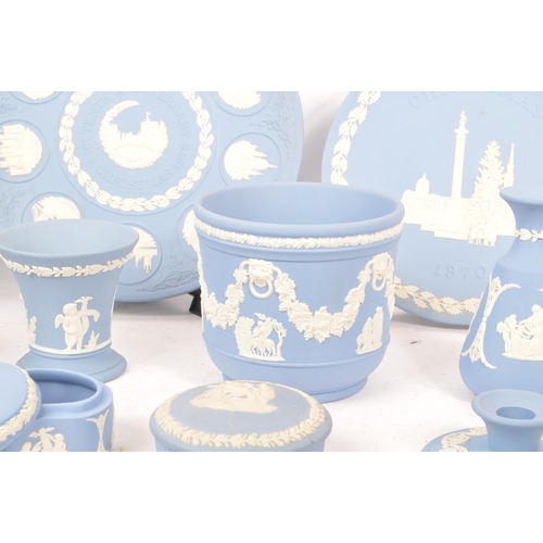 136 - Wedgwood Jasperware - A collection of 20th Century ceramic Wedgwood Jasperware items mostly in light... 