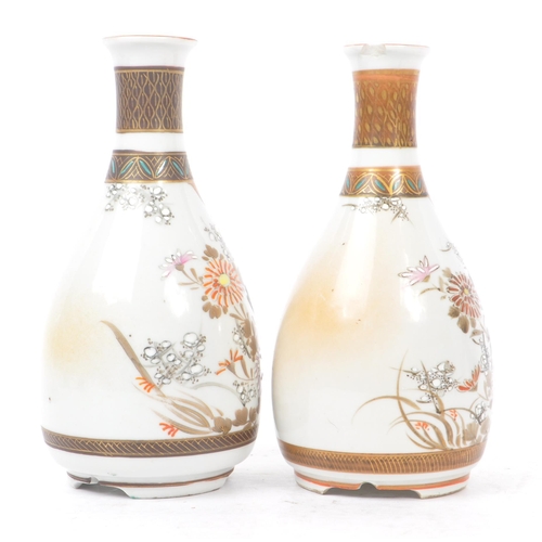 145 - A collection of five Japanese porcelain vase to include a pair of satsuma pottery vases having white... 