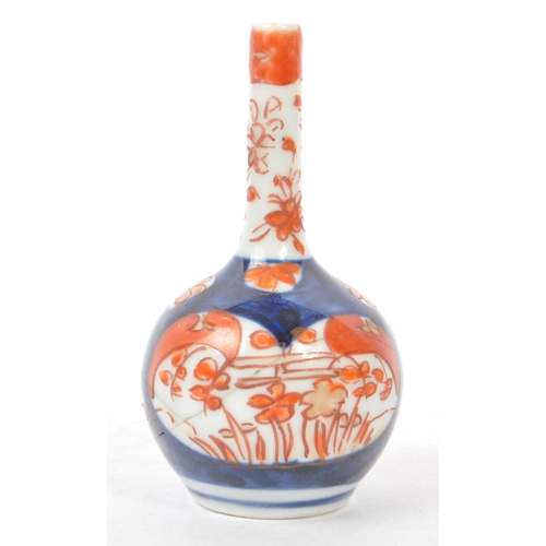 145 - A collection of five Japanese porcelain vase to include a pair of satsuma pottery vases having white... 