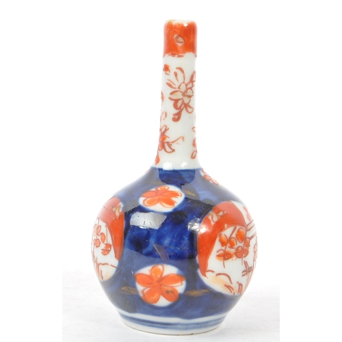 145 - A collection of five Japanese porcelain vase to include a pair of satsuma pottery vases having white... 