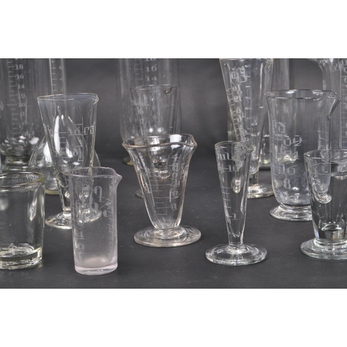 147 - A collection of vintage 20th Century glass scientific and laboratory / chemical measuring equipment ... 