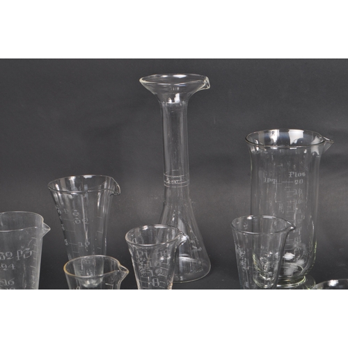 147 - A collection of vintage 20th Century glass scientific and laboratory / chemical measuring equipment ... 