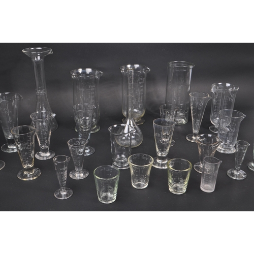 147 - A collection of vintage 20th Century glass scientific and laboratory / chemical measuring equipment ... 