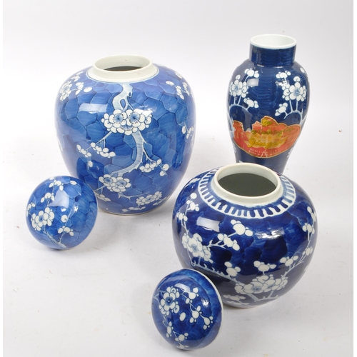 152 - Two large Chinese oriental blue and white porcelain ginger jars with lids accompanied by a vase, all... 