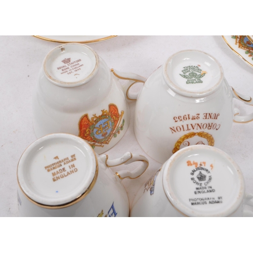 175 - A collection of 20th Century china items of Her Majesty Queen Elizabeth II commemorative china trios... 