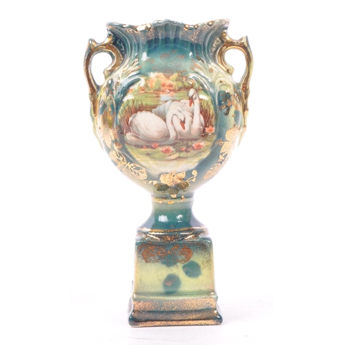 183 - Staffordshire - A large early 19th Century Staffordshire porcelain twin handled green and gilt vase ... 