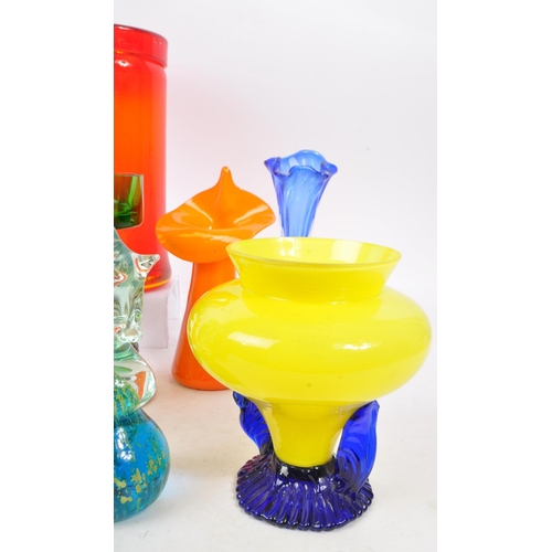 184 - A collection of mid 20th century studio art glass. The collection to include a variety of examples i... 