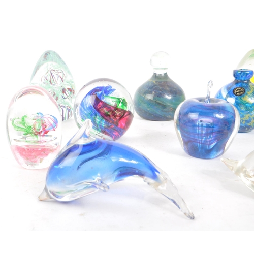 188 - A collection of 20th century glass paperweights. Including apple form examples, stem vase, signed md... 