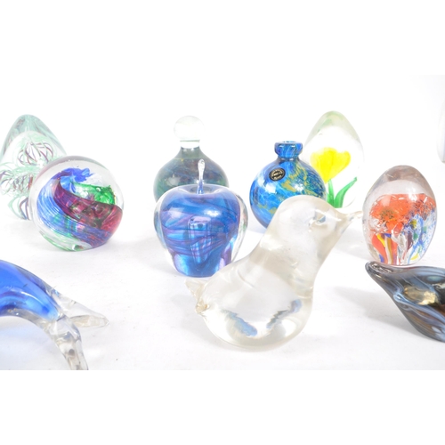 188 - A collection of 20th century glass paperweights. Including apple form examples, stem vase, signed md... 