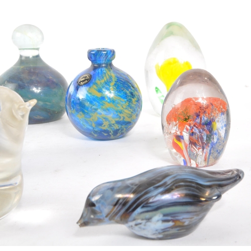 188 - A collection of 20th century glass paperweights. Including apple form examples, stem vase, signed md... 