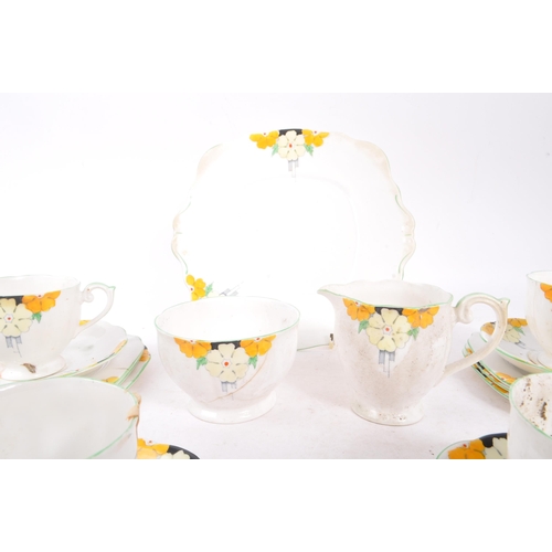 191 - Bell - An early 20th century circa 1930s Art Deco Bell china part tea service comprising cups, sauce... 