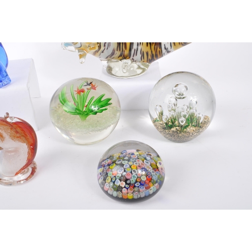 193 - A collection of mid 20th century studio art glass. The collection to include decorative sculptural p... 