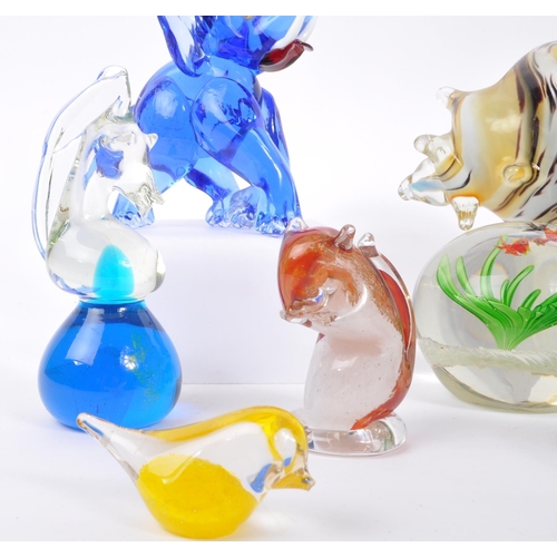 193 - A collection of mid 20th century studio art glass. The collection to include decorative sculptural p... 