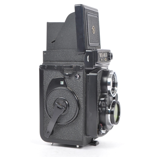 200 - Yashica - A mid 20th century Yashica Mat-124 G TLR medium format camera. The camera a twin lens refl... 