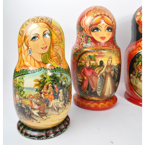 202 - A collection of late 20th century and later Russian USSR folk art Matryoshka graduating nest of doll... 