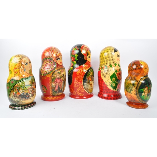 202 - A collection of late 20th century and later Russian USSR folk art Matryoshka graduating nest of doll... 